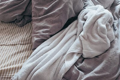 Period Care By Placing Towel Over Bedsheet