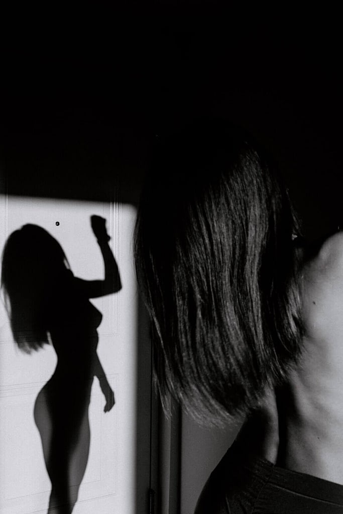 Woman And Her Shadow Woman Showing How To Look Thin