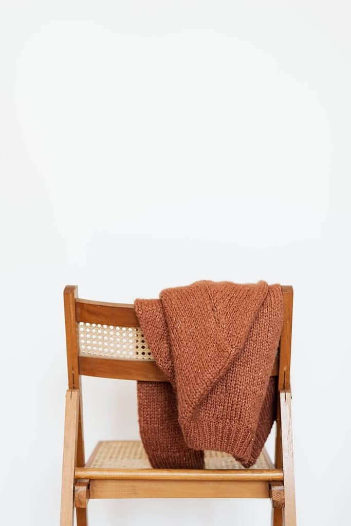 Sweater Hanging On Chair